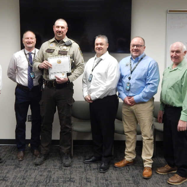 James "Jay" Dingmann receiving an award for 25 years with the BCSO.